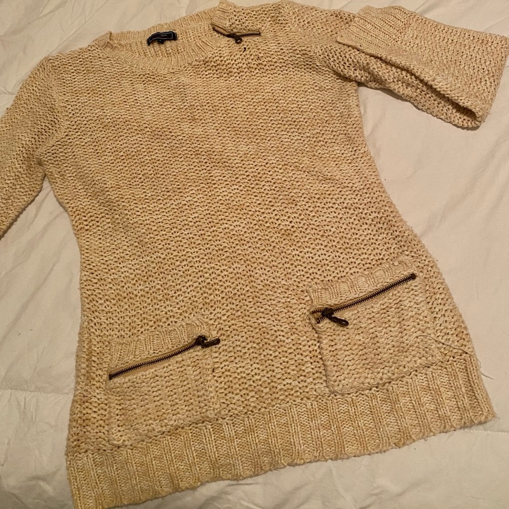 Sweater cream colored with adorable zipper detailing & pockets